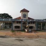 Entrance gate and signboard of Delta State University of Science and Technology, Ozoro