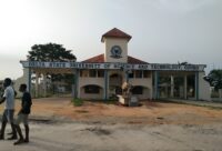 Entrance gate and signboard of Delta State University of Science and Technology, Ozoro