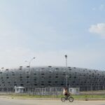 Wide exterior view of Godswill Akpabio International Stadium in Uyo, Nigeria, showing the stadium bowl and stands